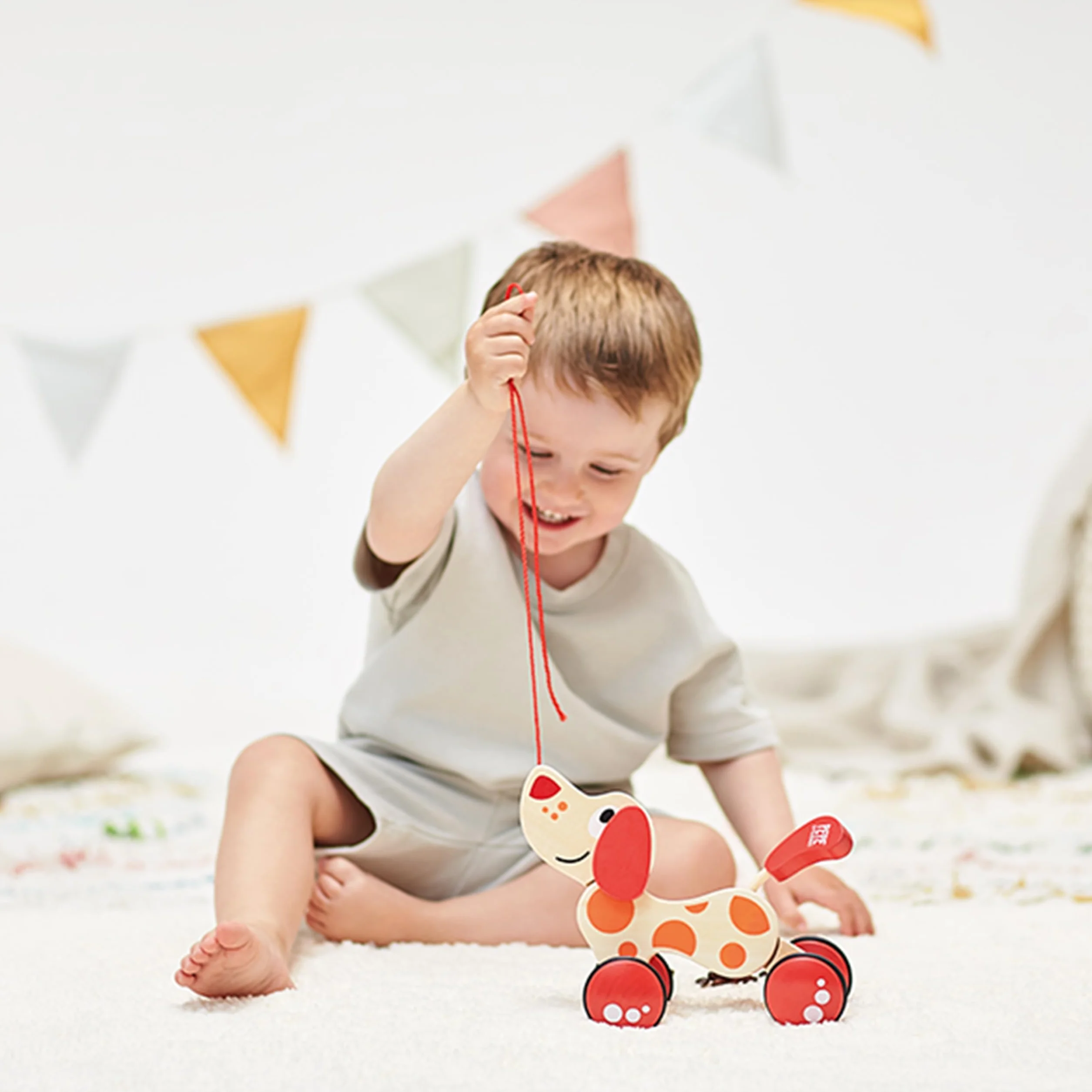 Hape Chien Jouet en Bois à Tirer et Pousser pour Enfant 1 an - Motricité, Imagination & Dextérité