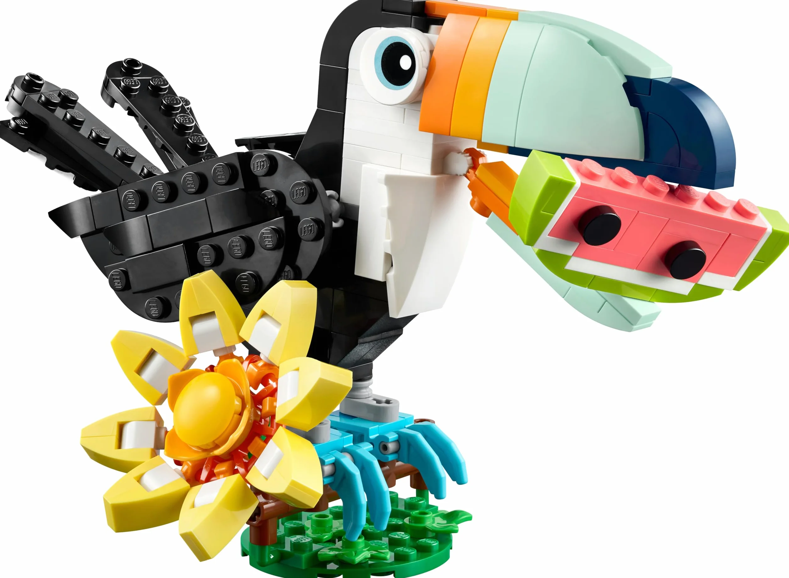 LEGO Creator 3-en-1 Animaux Sauvages Toucan Tropical Oiseau avec Fleur Jouet Animal Transformable Papillon Poisson Tropical Cadeau 7 Ans 31173